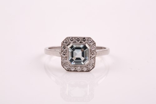 Lot 20 - A platinum, diamond, and aquamarine ring, set...