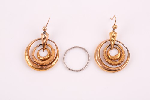 Lot 105 - A pair of Victorian yellow metal triple hoop...