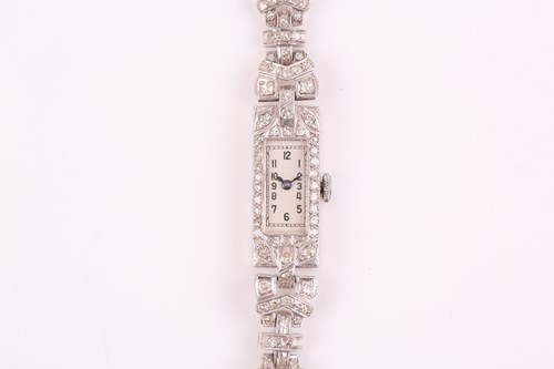 Lot 389 - A platinum, white gold, and diamond cocktail...