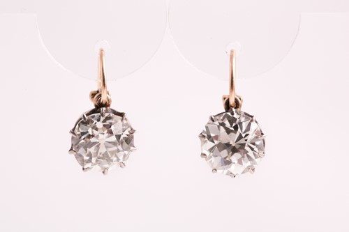 Lot 373 - A pair of Old European cut solitaire diamond...