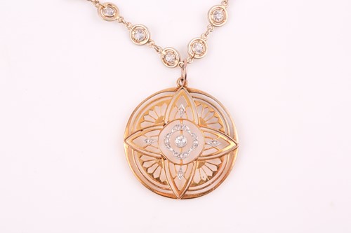Lot 199 - A yellow metal and diamond pendant, the...