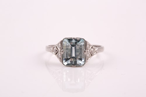Lot 297 - A platinum, diamond, and aquamarine ring, set...