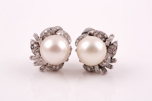 Lot 63 - A pair of diamond and pearl cluster earrings,...