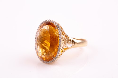 Lot 36 - A 14ct yellow gold, diamond, and citrine...