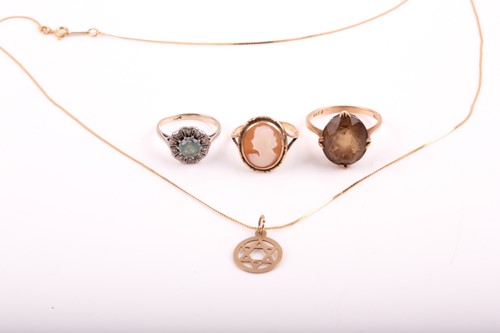 Lot 252 - A white metal, diamond, and pale blue gemstone...