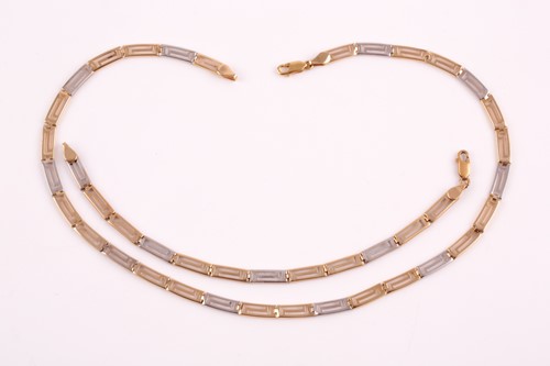 Lot 344 - A yellow and white metal rectangular flat-link...