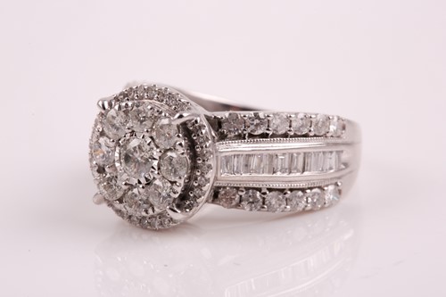Lot 69 - A 14ct white gold and diamond cluster ring,...