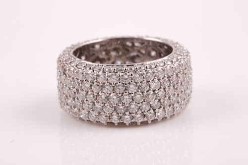 Lot 50 - An 18ct white gold and diamond eternity band...