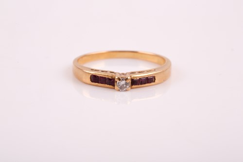 Lot 385 - A yellow metal, diamond, and ruby ring, set...