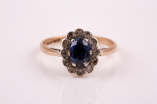Lot 307 - A 9ct yellow gold, sapphire, and white paste...