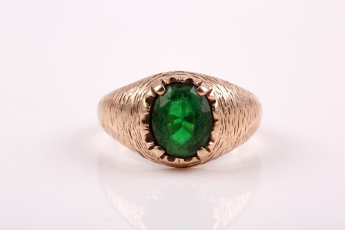 Lot 201 - A unisex yellow metal and green paste stone...