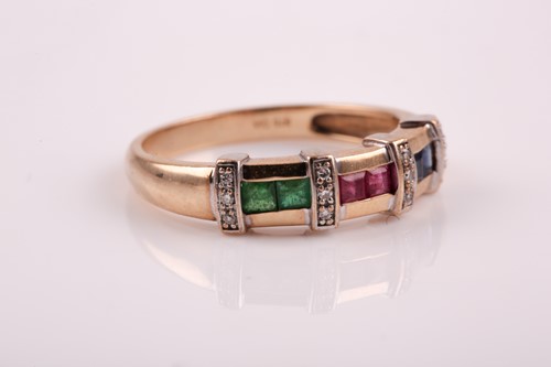 Lot 51 - A 9ct yellow gold, sapphire, ruby, and emerald...