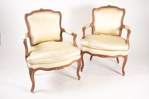 Lot 231 - A pair of French Louis XV carved beechwood...