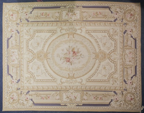 Lot 320 - A 20th century "Aubusson" style carpet with...