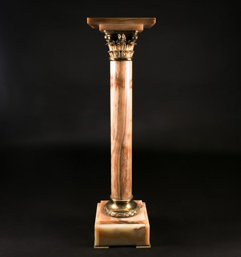 Lot 246 - A late 19th century onyx and gilt metal...