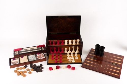 Lot 437 - A Victorian coromandel dome-top games...