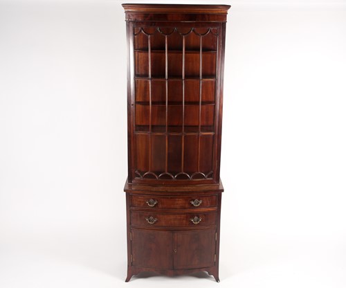 Lot 296 - A George III style mahogany bowfront display...