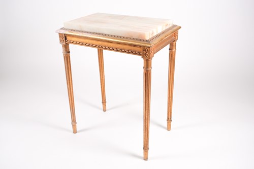 Lot 273 - A Louis XVI style, rectangular, carved, and...