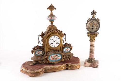 Lot 434 - A Victorian gilt spelter mantel clock, set...