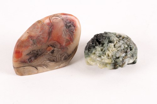 Lot 145 - A Chinese white and spinach green jade...