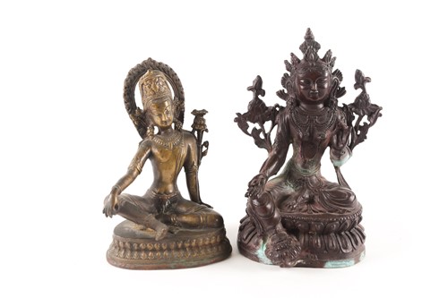 Lot 141 - A Sino Tibetan patinated bronze figure of...