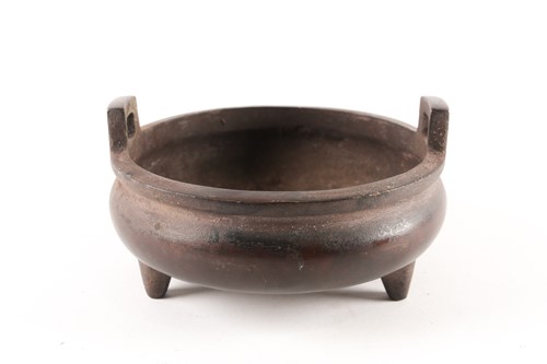 Lot 157 - A Chinese brown patinated two-handle tripod...