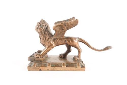Lot 449 - A cast brass grand tour style brass scroll...