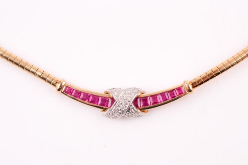 Lot 240 - A yellow metal choker chanel set with twelve...