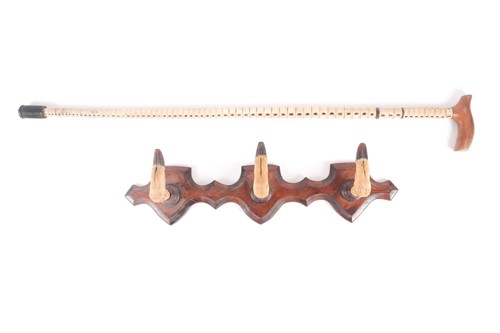 Lot 143 - An early 20th century sharks vertebrae walking...