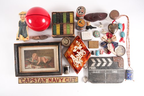Lot 12 - A vintage embossed and lithographed tin...
