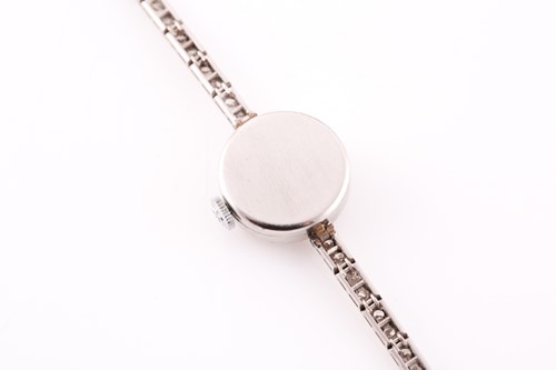 Lot 524 - Girard Perregaux. A lady's diamond cocktail...