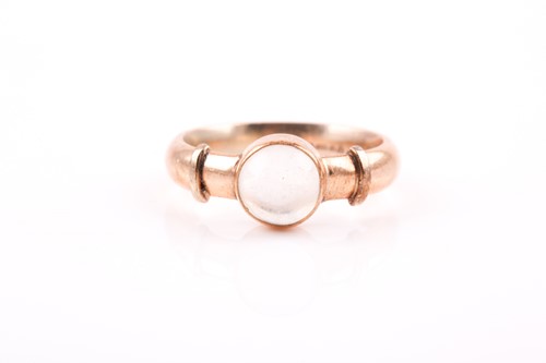 Lot 126 - A 9ct yellow gold and moonstone ring, rubover...