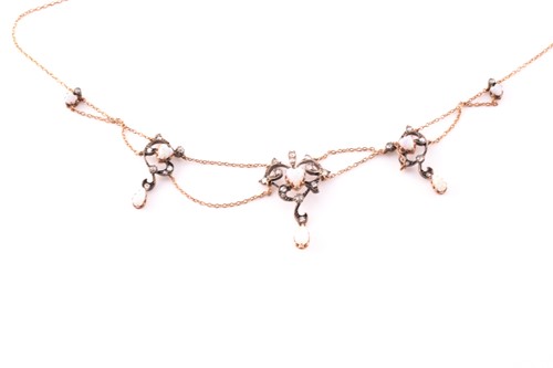 Lot 118 - Early 20th century opal and diamond swag...