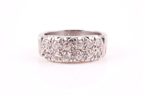Lot 122 - A diamond ring, the white metal shank inset...