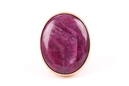 Lot 64 - A 9ct yellow gold and ruby ring, set with a...