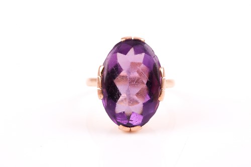 Lot 198 - A mid 20th century yellow metal and amethyst...