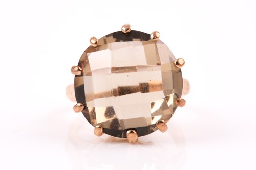 Lot 51 - A 9ct yellow gold and citrine ring, set with a...