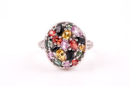 Lot 115 - A 9ct white gold and multi-coloured sapphire...