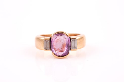 Lot 47 - A yellow metal, diamond, and sapphire ring,...
