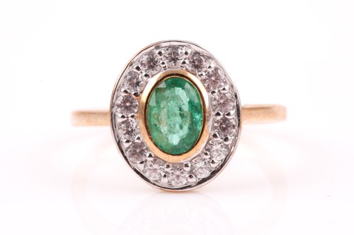 Lot 100 - A 9ct yellow gold, emerald, and cubic zirconia...