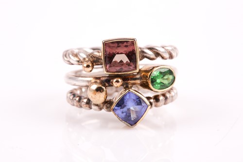 Lot 183 - An unusual silver dress ring, with gilt mounts...