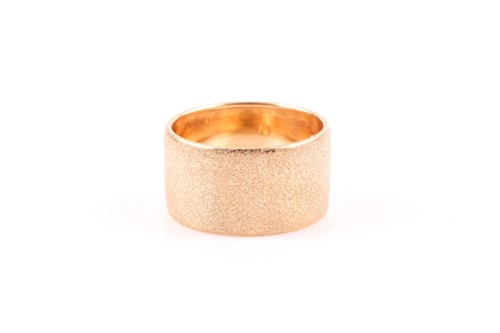 Lot 151 - An Italian 9ct yellow gold band ring, with...
