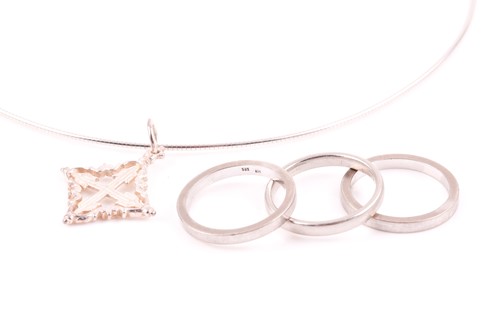 Lot 44 - A pair of 14ct white gold band rings, slightly...