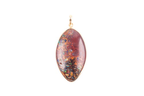 Lot 56 - An 18ct yellow gold mounted boulder opal...