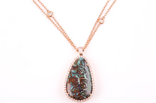 Lot 26 - A rose gold, diamond, and boulder opal...