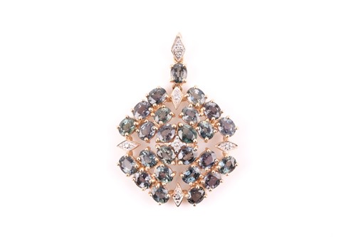 Lot 103 - A 9ct yellow gold and colour-change sapphire...