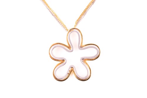 Lot 30 - An 18ct white and yellow gold floral splash...