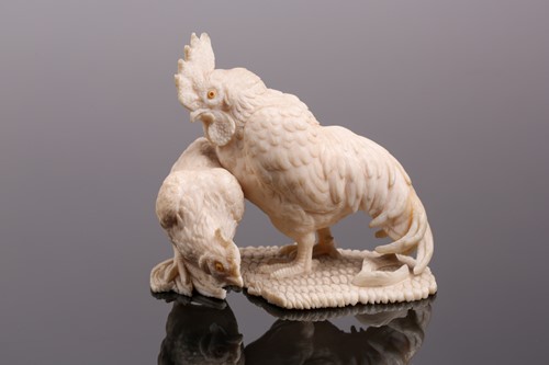 Lot 85 - A Japanese ivory okimono, Meiji period, carved...