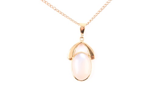 Lot 97 - A yellow metal and moonstone pendant, set with...