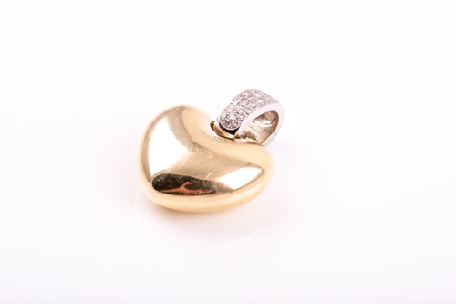 Lot 19 - A 14ct yellow and white gold pendant, the...